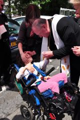 2011 Lourdes Pilgrimage - Archbishop Dolan with Malades (27/267)